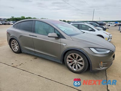 Czwarte zdjęcie samochodu z boku: 2016 TESLA MODEL X VIN:5YJXCAE47GFS00618 - miniatura