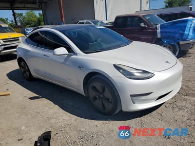 Czwarte zdjęcie samochodu z boku: 2020 TESLA MODEL 3 VIN:5YJ3E1EA8LF659472 - miniatura