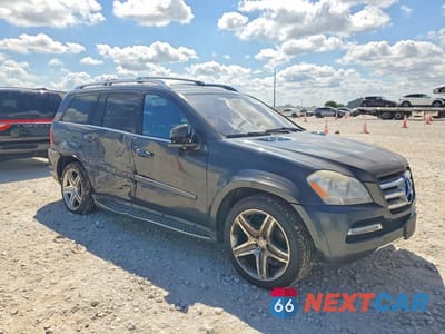 Czwarte zdjęcie samochodu z boku: 2011 MERCEDES-BENZ GL 550 4MATIC VIN:4JGBF8GE1BA712923 - miniatura