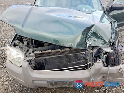 Zdjęcie 11 z 11 samochodu: 2002 FORD ESCAPE XLT VIN:1FMYU04102KB97720 - miniatura