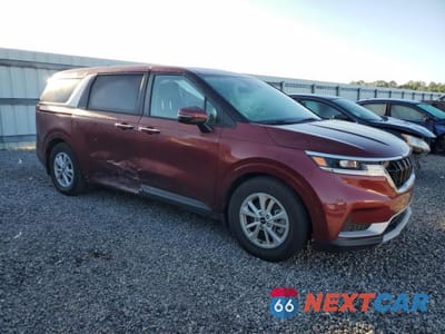 Czwarte zdjęcie samochodu z boku: 2023 KIA CARNIVAL LX VIN:KNDNB4H3XP6243747 - miniatura