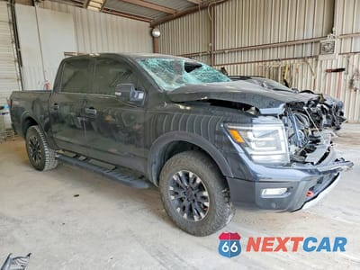 Czwarte zdjęcie samochodu z boku: 2021 NISSAN TITAN PRO-4X VIN:1N6AA1ED3MN510108 - miniatura