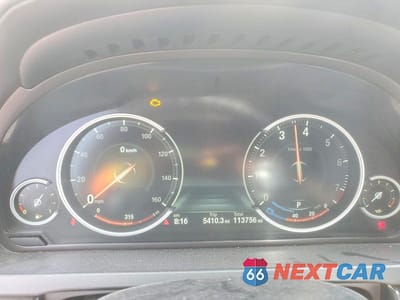 Zdjęcie 9 z 13 samochodu: 2014 BMW 740 I VIN:WBAYA6C50ED144154 - miniatura