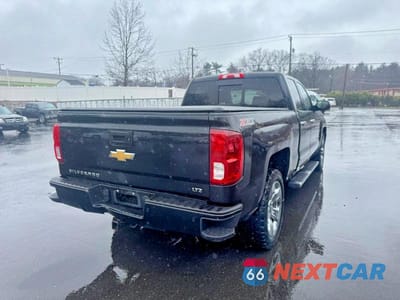 Trzecie zdjęcie samochodu z tyłu: 2017 CHEVROLET SILVERADO K1500 LTZ VIN:1GCVKSEC8HZ394806 - miniatura