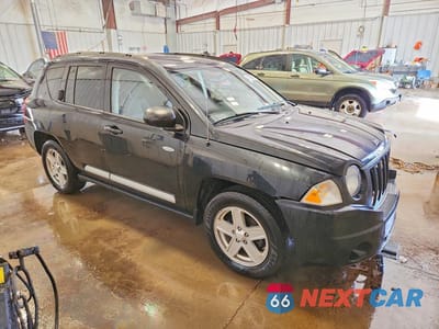 Czwarte zdjęcie samochodu z boku: 2010 JEEP COMPASS SPORT VIN:1J4NF1FB7AD675836 - miniatura