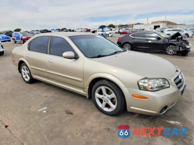 Czwarte zdjęcie samochodu z boku: 2003 NISSAN MAXIMA GXE VIN:JN1DA31D13T525270 - miniatura