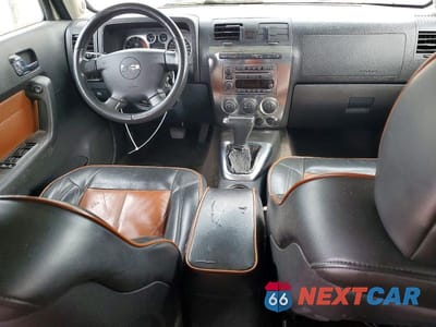Zdjęcie 8 z 13 samochodu: 2006 HUMMER H3 VIN:5GTDN136868101685 - miniatura