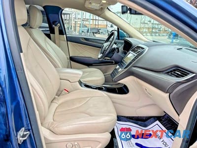 Piąte zdjęcie samochodu w środku: 2018 LINCOLN MKC RESERVE VIN:5LMCJ3D94JUL14242 - miniatura