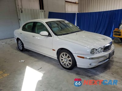 Czwarte zdjęcie samochodu z boku: 2003 JAGUAR X-TYPE VIN:SAJEA51D03XD22994 - miniatura