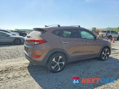 Trzecie zdjęcie samochodu z tyłu: 2016 HYUNDAI TUCSON LIMITED VIN:KM8J33A20GU152629 - miniatura
