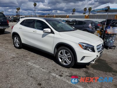 Czwarte zdjęcie samochodu z boku: 2015 MERCEDES-BENZ GLA 250 VIN:WDCTG4EBXFJ153007 - miniatura