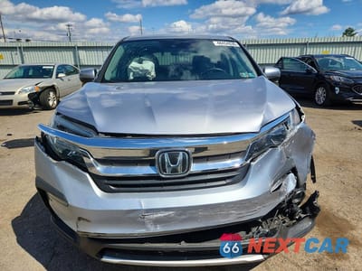 Piąte zdjęcie samochodu w środku: 2021 HONDA PILOT EX VIN:5FNYF6H39MB049336 - miniatura