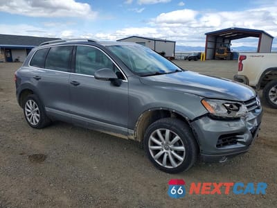 Czwarte zdjęcie samochodu z boku: 2011 VOLKSWAGEN TOUAREG V6 VIN:WVGFF9BP3BD002243 - miniatura