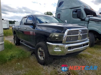 Czwarte zdjęcie samochodu z boku: 2012 DODGE RAM 3500 LARAMIE VIN:3C63D3EL3CG243606 - miniatura