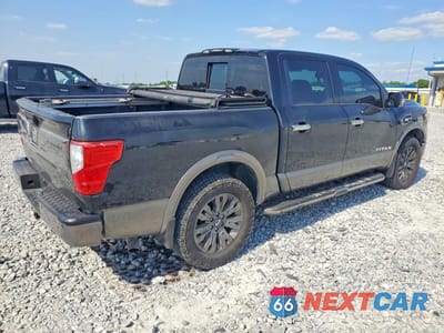 Trzecie zdjęcie samochodu z tyłu: 2017 NISSAN TITAN PLATINUM RESERVE VIN:1N6AA1E68HN520365 - miniatura