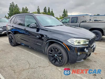 Czwarte zdjęcie samochodu z boku: 2018 BMW X5 XDR40E VIN:5UXKT0C55J0W01573 - miniatura