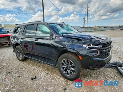 Czwarte zdjęcie samochodu z boku: 2024 CHEVROLET TAHOE K1500 Z71 VIN:1GNSKPKD8RR381799 - miniatura
