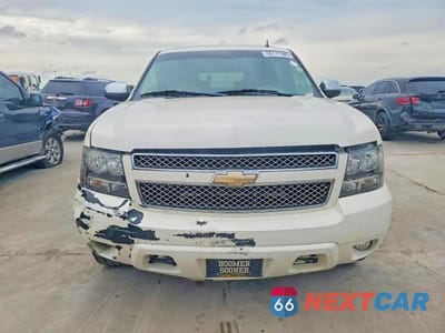 Piąte zdjęcie samochodu w środku: 2011 CHEVROLET SUBURBAN C1500 LTZ VIN:1GNSCKE02BR289361 - miniatura