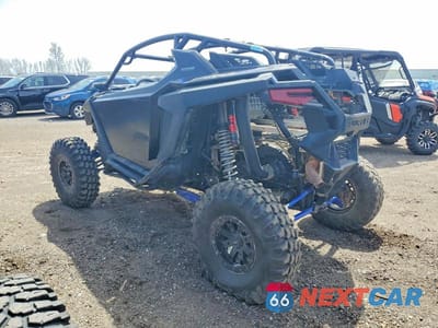 Trzecie zdjęcie samochodu z tyłu: 2022 POLARIS RZR PRO XP UTILITY VEHICLE VIN:3NSMAD927NF347004 - miniatura