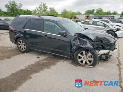 Czwarte zdjęcie samochodu z boku: 2009 CADILLAC SRX VIN:1GYEE637690115549 - miniatura