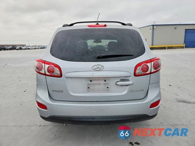 Zdjęcie 6 z 12 samochodu: 2010 HYUNDAI SANTA FE GLS VIN:5NMSG3AB8AH402162 - miniatura