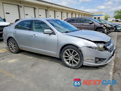 Czwarte zdjęcie samochodu z boku: 2011 FORD FUSION S VIN:3FAHP0GA3BR337669 - miniatura