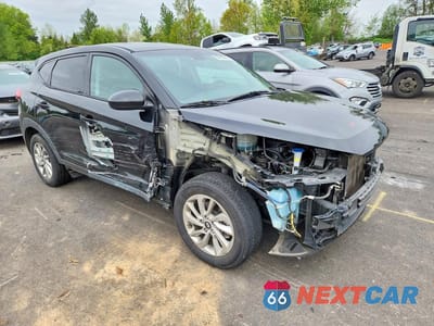 Czwarte zdjęcie samochodu z boku: 2017 HYUNDAI TUCSON SE VIN:KM8J23A40HU555998 - miniatura