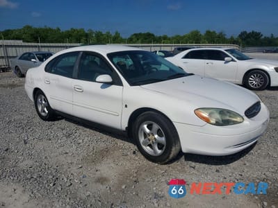 Czwarte zdjęcie samochodu z boku: 2002 FORD TAURUS SE VIN:1FAFP53262A175596 - miniatura