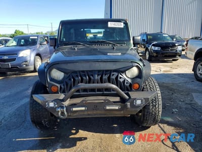 Piąte zdjęcie samochodu w środku: 2010 JEEP WRANGLER UNLIMITED SPORT VIN:1J4HA3H12AL125218 - miniatura
