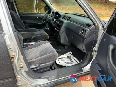 Piąte zdjęcie samochodu w środku: 1999 HONDA CR-V EX VIN:JHLRD186XXC083443 - miniatura