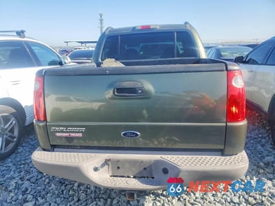 Zdjęcie 6 z 12 samochodu: 2001 FORD EXPLORER SPORT TRAC VIN:1FMZU67E31UB71458 - miniatura