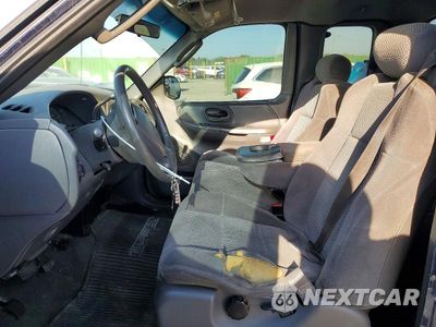 Zdjęcie 7 z 12 samochodu: 2002 FORD F150 VIN:2FTRX18W32CA68855 - miniatura