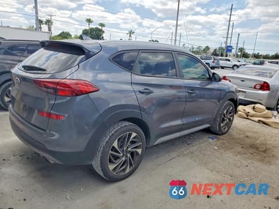 Trzecie zdjęcie samochodu z tyłu: 2021 HYUNDAI TUCSON SPORT VIN:KM8J33ALXMU286424 - miniatura