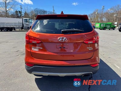 Zdjęcie 6 z 11 samochodu: 2015 HYUNDAI SANTA FE SPORT 2.4L VIN:5XYZTDLB5FG301630 - miniatura