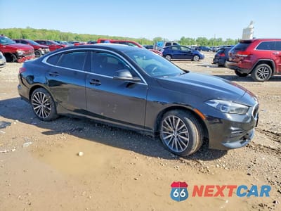 Czwarte zdjęcie samochodu z boku: 2022 BMW 228I VIN:WBA53AK06N7K44344 - miniatura