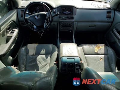 Zdjęcie 8 z 12 samochodu: 2003 HONDA PILOT EXL VIN:2HKYF18623H592184 - miniatura