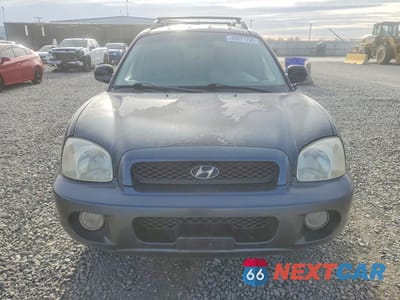 Piąte zdjęcie samochodu w środku: 2002 HYUNDAI SANTA FE GLS VIN:KM8SC73D12U149225 - miniatura