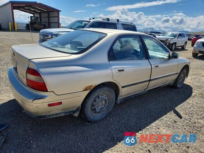 Trzecie zdjęcie samochodu z tyłu: 1994 HONDA ACCORD LX VIN:JHMCD5549RC013222 - miniatura