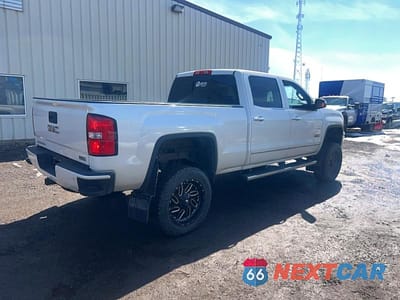 Czwarte zdjęcie samochodu z boku: 2015 GMC SIERRA K1500 SLT VIN:3GTU2VEC8FG443383 - miniatura