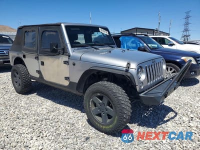 Czwarte zdjęcie samochodu z boku: 2018 JEEP WRANGLER UNLIMITED SPORT VIN:1C4HJWDG9JL930991 - miniatura