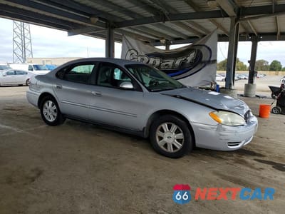 Czwarte zdjęcie samochodu z boku: 2005 FORD TAURUS SEL VIN:1FAFP56245A239585 - miniatura