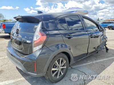 Trzecie zdjęcie samochodu z tyłu: 2018 TOYOTA PRIUS C FOUR VIN:JTDKDTB39J1606558 - miniatura