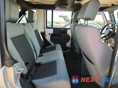 Zdjęcie 10 z 12 samochodu: 2010 JEEP WRANGLER UNLIMITED SPORT VIN:1J4BA3H19AL217822 - miniatura