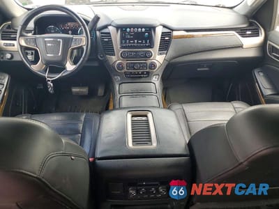 Zdjęcie 8 z 12 samochodu: 2017 GMC YUKON DENALI VIN:1GKS1CKJ5HR213163 - miniatura