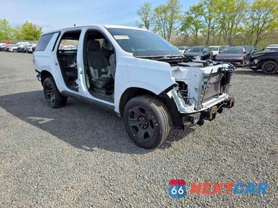 Trzecie zdjęcie samochodu z tyłu: 2022 CHEVROLET TAHOE K1500 VIN:1GNSKLED8NR304848 - miniatura