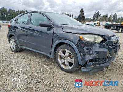 Czwarte zdjęcie samochodu z boku: 2016 HONDA HR-V LX VIN:3CZRU5H32GM703981 - miniatura