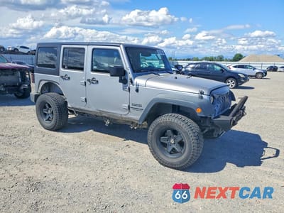 Czwarte zdjęcie samochodu z boku: 2014 JEEP WRANGLER UNLIMITED SPORT VIN:1C4BJWDG9EL260578 - miniatura