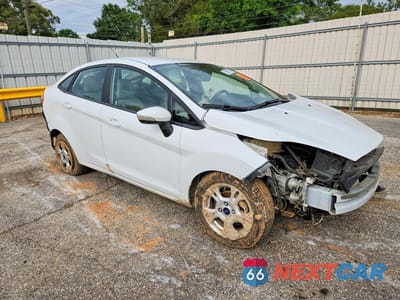 Czwarte zdjęcie samochodu z boku: 2014 FORD FIESTA SE VIN:3FADP4BJ1EM205329 - miniatura
