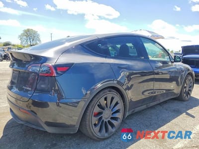 Trzecie zdjęcie samochodu z tyłu: 2024 TESLA MODEL Y VIN:7SAYGDEF1RF094572 - miniatura