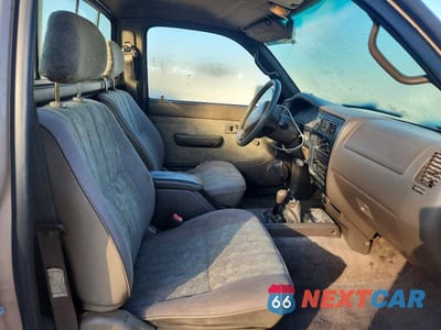 Zdjęcie 10 z 12 samochodu: 2000 TOYOTA TACOMA BASE VIN:4TAPM62N2YZ591370 - miniatura